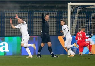 epa08828002 Andrea Belotti (L) of Italy celebrates after scoring 1-0 lead during the UEFA Nations League, League A, group 1 soccer match, between Bosnia and Herzegovina and Italy in Sarajevo, Bosnia and Herzegovina, 18 November 2020.  EPA/FEHIM DEMIR