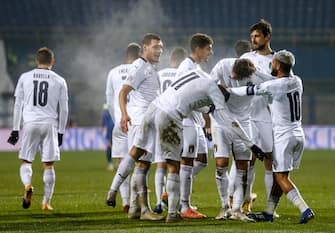 epa08828261 Domenico Berardi (C) of Italy celebrates with teammates  after scoring 2-0 lead during the UEFA Nations League, League A, group 1 soccer match, between Bosnia and Herzegovina and Italy in Sarajevo, Bosnia and Herzegovina, 18 November 2020.  EPA/FEHIM DEMIR