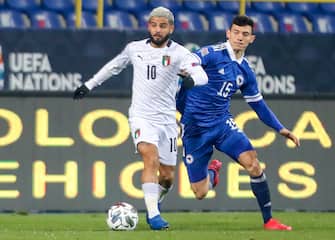 epa08827936 Lorenzo Insigne (L) of Italy in action against Josip Corluka (R) of Bosnia and Hercegovina during the UEFA Nations League, League A, group 1 soccer match, between Bosnia and Herzegovina and Italy in Sarajevo, Bosnia and Herzegovina, 18 November 2020.  EPA/FEHIM DEMIR