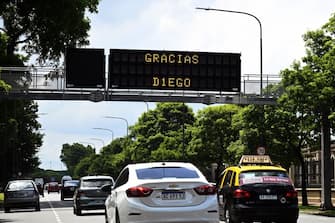An electronic traffic board reads Thank you Diego, referring to late Argentine football star Diego Maradona, in Buenos Aires on November 25, 2020, on the day of his death. (Photo by JUAN MABROMATA / AFP) (Photo by JUAN MABROMATA/AFP via Getty Images)