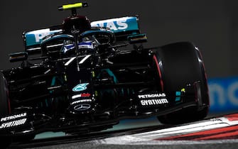 epa08879479 A handout photo made available by the FIA of Finnish Formula One driver Valtteri Bottas of Mercedes-AMG Petronas in action during the qualifying session of the Formula One Grand Prix of Abu Dhabi at Yas Marina Circuit in Abu Dhabi, United Arab Emirates, 12 December 2020. The Formula One Grand Prix of Abu Dhabi will take place on 13 December 2020.  EPA/FIA/F1 HANDOUT  HANDOUT EDITORIAL USE ONLY/NO SALES *** Local Caption *** BAHRAIN, BAHRAIN - NOVEMBER 26: <<enter caption here>> during previews ahead of the F1 Grand Prix of Bahrain at Bahrain International Circuit on November 26, 2020 in Bahrain, Bahrain. (Photo by Rudy Carezzevoli/Getty Images)