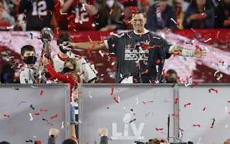 epaselect epa08995265 Tampa Bay Buccaneers quarterback Tom Brady celebrates with the Vince Lombardi Trophy as he stands with children (L-R) Benjamin, Jack and Vivian after the Buccaneers deafeated the Kansas City Chiefs to win the National Football League Super Bowl LV at Raymond James Stadium in Tampa, Florida, USA, 07 February 2021.  EPA/ERIK S. LESSER