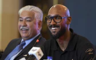 epa07415787 Former French soccer player Nicolas Anelka  (R) talks with journalists after he arrived to promote soccer in the country in Islamabad, Pakistan, 05 May 2019.  EPA/T. MUGHAL
