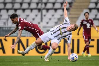 Juventus' Dutch defender Matthijs De Ligt (R) collides with Torino's Paraguayan forward Antonio Sanabria during the Italian Serie A football match Torino vs Juventus on April 03, 2021 at the Olympic stadium in Turin. (Photo by Marco BERTORELLO / AFP) (Photo by MARCO BERTORELLO/AFP via Getty Images)