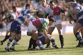 25 Oct 1997:  Massimo Cuttitta of Harlequins (centre) looks for support during the Allied Dunbar Premiership match against Sale at The Stoop in London. \ Mandatory Credit: Jamie McDonald /Allsport