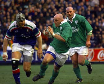 Ireland's captain Keith Woods (centre) breaks from the pack with Massimo Cuttitta (left) of  Italy giving chase during the Six Nations Championship rugby match at Lansdowne Road Dublin.   (Photo by Chris Bacon - PA Images/PA Images via Getty Images)