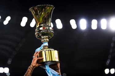 STADIO OLIMPICO, ROME, ITALY - 2020/06/17: The Coppa Italia (Italian Cup) trophy is lifted during the awards ceremony at end of the Coppa Italia final football match between SSC Napoli and Juventus FC. SSC Napoli won 4-2 over Juventus FC after penalty kicks, regular time ended 0-0. (Photo by NicolÃ² Campo/LightRocket via Getty Images)
