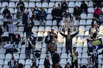 Juventus fans attend the final of the Italian Cup (Coppa Italia) football match Atalanta Bergamo vs Juventus Turin on May 19, 2021 at the Citta del Tricolore stadium in Reggio Emilia. (Photo by MIGUEL MEDINA / AFP) (Photo by MIGUEL MEDINA/AFP via Getty Images)