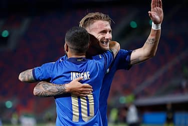 Italy's Lorenzo Insigne jubilates with his teammates after scoring the goal during the international friendly soccer match Italy vs Czech Republic at Renato Dall'Ara stadium in Bologna, Italy, 04 June 2021. ANSA /ELISABETTA BARACCHI
