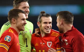 epa08010045 (from left) Aaron Ramsey, goalkeeper Wayne Hennessey, Gareth Bale and Chris Gunter of Wales celebrate after the UEFA EURO 2020 Group E qualification match between Wales and Hungary in Cardiff, Wales, Britain, 19 November 2019. Wales won 2-0.  EPA/PETER POWELL