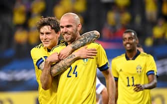 Sweden's defender Marcus Danielson (C) celebrates with his teammate Sweden's defender Victor Lindelof after scoring during the friendly football match Sweden vs Armenia on June 5, 2021, in Solna, in preparation for the UEFA European Championships. (Photo by Jonathan NACKSTRAND / AFP) (Photo by JONATHAN NACKSTRAND/AFP via Getty Images)
