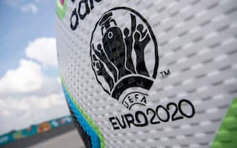epa09259631 A ball advertising for the upcoming Euro 2020 soccer tournament in front of the Soccer Stadium in Munich, Germany, 10 June 2021. The UEFA EURO 2020 soccer tournament will be held from 11 June to 11 July 2021.  EPA/LUKAS BARTH-TUTTAS