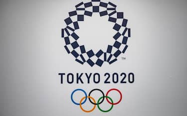 The Tokyo 2020 logo is seen at the Tokyo International Exhibition Centre, also known as Tokyo Big Sight, where the International Broadcast Centre and Main Press Centre for the Tokyo 2020 Olympic and Paralympic Games are located, in Tokyo on June 28, 2021. (Photo by Philip FONG / AFP) (Photo by PHILIP FONG/AFP via Getty Images)