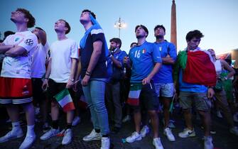 ROME, ITALY - JULY 06: Fans watch the UEFA Euro 2020 Championship Semi-final match between Italy and Spain at the UEFA Rome Fan Zone in Vai dei Fori Imperiali on July 06, 2021 in Rome, Italy. (Photo by Ernesto Ruscio - UEFA/UEFA via Getty Images)