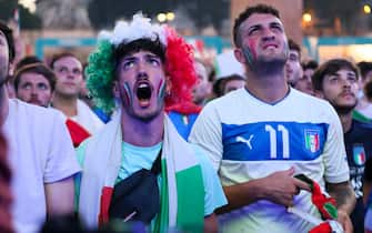 ROME, ITALY - JULY 06: Fans watch the UEFA Euro 2020 Championship Semi-final match between Italy and Spain at the UEFA Rome Fan Zone in Vai dei Fori Imperiali on July 06, 2021 in Rome, Italy. (Photo by Ernesto Ruscio - UEFA/UEFA via Getty Images)