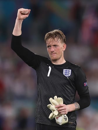 epa09321491 England goalkeeper Jordan Pickford celebrates after the UEFA EURO 2020 quarter final match between Ukraine and England in Rome, Italy, 03 July 2021.  EPA/Mike Hewitt / POOL (RESTRICTIONS: For editorial news reporting purposes only. Images must appear as still images and must not emulate match action video footage. Photographs published in online publications shall have an interval of at least 20 seconds between the posting.)