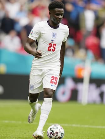 epa09311294 Bukayo Saka of England in action during the UEFA EURO 2020 round of 16 soccer match between England and Germany in London, Britain, 29 June 2021.  EPA/Frank Augstein / POOL (RESTRICTIONS: For editorial news reporting purposes only. Images must appear as still images and must not emulate match action video footage. Photographs published in online publications shall have an interval of at least 20 seconds between the posting.)