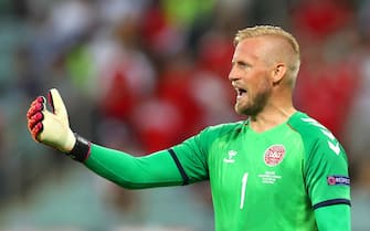 epa09320579 Denmark's goalkeeper Kasper Schmeichel reacts during the UEFA EURO 2020 quarter final match between the Czech Republic and Denmark in Baku, Azerbaijan, 03 July 2021.  EPA/Naomi Baker / POOL (RESTRICTIONS: For editorial news reporting purposes only. Images must appear as still images and must not emulate match action video footage. Photographs published in online publications shall have an interval of at least 20 seconds between the posting.)
