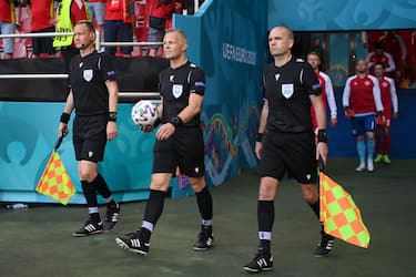 COPENHAGEN, DENMARK - JUNE 17: Referee Bjoern Kuipers, and his Assistant Referees Sander van Roekel, and Erwin Zeinstra walk out prior to the UEFA Euro 2020 Championship Group B match between Denmark and Belgium at Parken Stadium on June 17, 2021 in Copenhagen, Denmark. (Photo by Oliver Hardt - UEFA/UEFA via Getty Images)