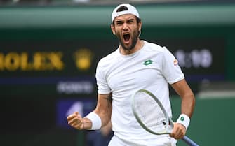 epa09337384 Matteo Berrettini of Italy reacts during the men's final against Novak Djokovic of Serbia  at the Wimbledon Championships, Wimbledon, Britain 11 July 2021.  EPA/NEIL HALL   EDITORIAL USE ONLY