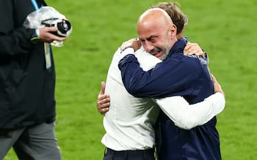 11 July 2021, United Kingdom, London: Football: European Championship, Italy - England, final round, final at Wembley Stadium. Football: European Championship, Italy - England, final round, final at Wembley Stadium. Italy coach Roberto Mancini (l) and Gianluca Vialli, head of the Italian national team delegation, hug after winning the penalty shootout. Photo: Christian Charisius/dpa (Photo by Christian Charisius/picture alliance via Getty Images)