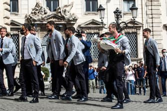 Captain of Italy Giorgio Chiellini carries the European Championship trophy to arrive at the Quirinale Palace to be met by Italian President Sergio Mattarella to celebrate the Italy national football team that returned from London after winning the UEFA EURO 2020 championship, Rome, Italy, 12 July 2021. ANSA/ANGELO CARCONI