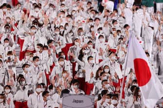 epa09359886 The Japanese delegation parades during the Opening Ceremony of the Tokyo 2020 Olympic Games at the Olympic Stadium in Tokyo, Japan, 23 July 2021.  EPA/YONHAP SOUTH KOREA OUT