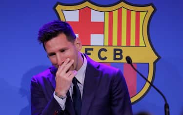 epa09405789 Argentine forward Lionel Messi gets emotional during a press conference to explain his version of the reasons for his departure from Barcelona FC in Barcelona, Spain, 08 August 2021.  FC Barcelona issued a statement on 05 August announcing Argentinian striker Lionel Messi will not extend his contract with the team due to 'economic and structural obstacles'.  EPA/ANDREU DALMAU