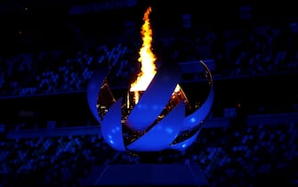 TOKYO, JAPAN - AUGUST 08: The Olympic Flame is seen during the Closing Ceremony of the Tokyo 2020 Olympic Games at Olympic Stadium on August 08, 2021 in Tokyo, Japan. (Photo by Dan Mullan/Getty Images)