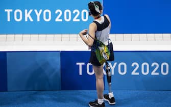 epa09425730 A woman waits during a training session at the Tokyo 2020 Paralympics Games in the Aquatics Centre in Tokyo, Japan, 23 August 2021. The Paralympics games start on 24 August with the and last until 05 September 2021.  EPA/ENNIO LEANZA