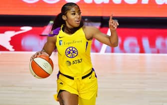 PALMETTO, FLORIDA - AUGUST 21: Te'a Cooper #4 of the Los Angeles Sparks points during the first half of a game against the Atlanta Dream at Feld Entertainment Center on August 21, 2020 in Palmetto, Florida. NOTE TO USER: User expressly acknowledges and agrees that, by downloading and or using this photograph, User is consenting to the terms and conditions of the Getty Images License Agreement. (Photo by Julio Aguilar/Getty Images)
