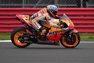 NORTHAMPTON, ENGLAND - AUGUST 27: Pol Espargaro of Spain and Repsol Honda Team heads down a straight during the MotoGP of Great Britain - Free Practice at Silverstone Circuit on August 27, 2021 in Northampton, England. (Photo by Mirco Lazzari gp/Getty Images)