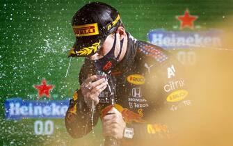 epa09449528 Dutch Max Verstappen (Red Bull Racing) celebrates winning the Dutch Formula One Grand Prix at Zandvoort, the Netherlands, 05 September 2021.  EPA/KOEN VAN WEEL