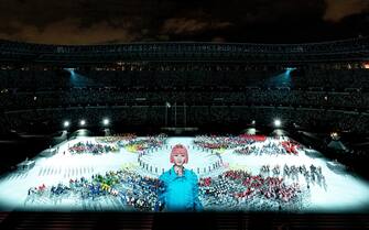 epa09448880 A handout photo made available by OIS/IOC shows fireworks going off around the rim of the Stadium as athletes watch from seats on the Field of Play whilst performers and a light show entertain them in the This is Tokyo segment of Closing Ceremony for the Tokyo 2020 Paralympic Games, Tokyo, Japan, 05 September 2021.  EPA/Joe Toth for OIS HANDOUT   EDITORIAL USE ONLY/NO SALES