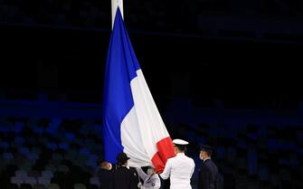 TOKYO, JAPAN - SEPTEMBER 05: The national flag of France is raised during the Closing Ceremony on day 12 of the Tokyo 2020 Paralympic Games at Olympic Stadium on September 05, 2021 in Tokyo, Japan. (Photo by Carmen Mandato/Getty Images)