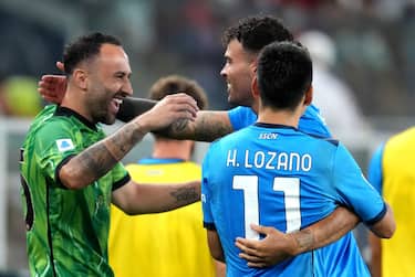 GENOA, ITALY - AUGUST 29: Andrea Petagna of SSC Napoli celebrates the win with team mates David Ospina and Hirving Lozano ,during the Serie A match between Genoa CFC and SSC Napoli at Stadio Luigi Ferraris on August 29, 2021 in Genoa, . (Photo by MB Media/Getty Images)