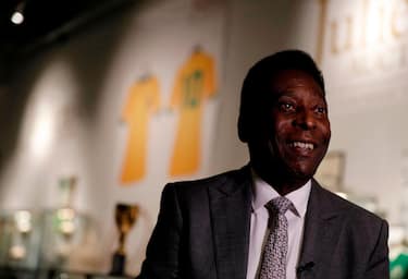 Former Brazilian footballer Pele talks during an media interview at a preview for an auction of his memorabilia in London on June 1, 2016. - The three-time World Cup winner and FIFA Player of the Century is offering to auction his vast memorabilia collection including awards, personal property and iconic items from his entire career. The collection is being offered by Julien's Auction House on June 7, 8, 9 in London. (Photo by ADRIAN DENNIS / AFP) (Photo by ADRIAN DENNIS/AFP via Getty Images)