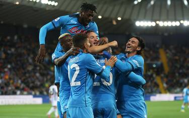 Napoli s Amir Rrahmani (C) jubilates with his teammates after scoring the goal during the Italian Serie A soccer match Udinese Calcio vs SSC Napoli at the Friuli - Dacia Arena stadium in Udine, Italy, 20 September 2021. ANSA/GABRIELE MENIS