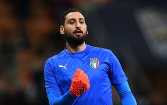 MILAN, ITALY - OCTOBER 06: Gianluigi Donnarumma of Italy warms up ahead before the UEFA Nations League 2021 Semi-final match between Italy and Spain at Giuseppe Meazza Stadium on October 06, 2021 in Milan, Italy. (Photo by Claudio Villa/Getty Images)