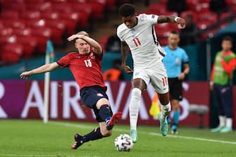 England's forward Marcus Rashford (R) and Czech Republic's midfielder Petr Sevcik vie for the ball during the UEFA EURO 2020 Group D football match between Czech Republic and England at Wembley Stadium in London on June 22, 2021. (Photo by JUSTIN TALLIS / POOL / AFP) (Photo by JUSTIN TALLIS/POOL/AFP via Getty Images)