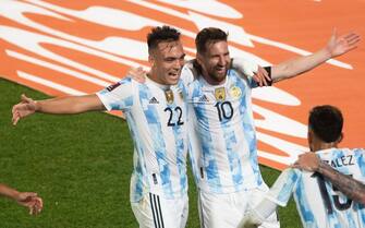 BUENOS AIRES, ARGENTINA - 2021/10/10: Lautaro Martinez (left) celebrates a goal with Lionel Messi (2nd right) of Argentina during the FIFA World Cup 2022 Qatar qualifying match Between Argentina and Uruguay in Buenos Aires.
(Final score; Argentina 3:0 Uruguay). (Photo by Manuel Cortina/SOPA Images/LightRocket via Getty Images)