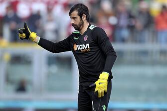 LIVORNO, ITALY - MARCH 16: Gianluca Curci of Bologna FC gestures during the Serie A match between AS Livorno Calcio and Bologna FC at Stadio Armando Picchi on March 16, 2014 in Livorno, Italy.  (Photo by Gabriele Maltinti/Getty Images)