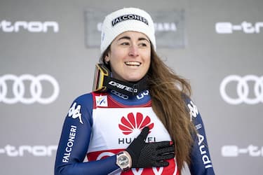 Sofia Goggia of Italy celebrates on the podium after winning the women's Downhill race of the FIS Alpine Skiing World Cup in Crans-Montana, Switzerland, 22 January 2021.  ANSA/ALESSANDRO DELLA VALLE