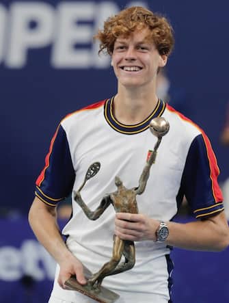 epa09543862 Jannik Sinner of Italy poses with the trophy after winning 6-2, 6-2 against Diego Schwartzman from Argentina during the final of the European Open ATP world tour tennis tournement in Antwerp, Belgium, 24 October 2021.  EPA/OLIVIER HOSLET