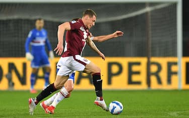 TURIN, ITALY - OCTOBER 30:  Andrea Belotti of Torino FC in action against Adrien Silva of UC Sampdoria during the Serie A match between c at Stadio Olimpico di Torino on October 31, 2021 in Turin, Italy.  (Photo by Valerio Pennicino/Getty Images)