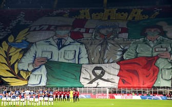 Milan s supporters display a banner in memory of the victim of Covid-19 during the Italian serie A soccer match between AC Milan and Fc Inter at Giuseppe Meazza stadium in Milan, 7 November  2021.
ANSA / MATTEO BAZZI