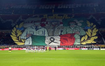 Milan s supporters display a banner in memory of the victim of Covid-19 during the Italian serie A soccer match between AC Milan and Fc Inter at Giuseppe Meazza stadium in Milan, 7 November  2021.
ANSA / MATTEO BAZZI