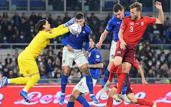 Italy's Giovanni Di Lorenzo (C) scores the 1-1 goal during the 2022 FIFA World Cup European qualifying  Group C soccer match between Italy and Switzerland at the Olimpico stadium in Rome, Italy, 12 November 2021.  ANSA/ETTORE FERRARI