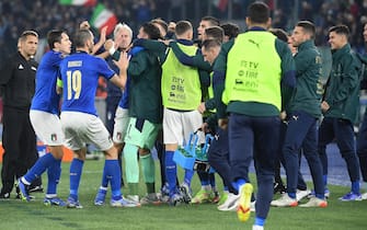 Italy's Giovanni Di Lorenzo (C) celebrates after scoring the 1-1 goal with his teammates during the 2022 FIFA World Cup European qualifying  Group C soccer match between Italy and Switzerland at the Olimpico stadium in Rome, Italy, 12 November 2021.  ANSA/ETTORE FERRARI