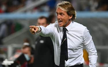 Italy's coach Roberto Mancini gestures during the FIFA World Cup Qatar 2022 Group C qualification football match between Italy and Lithuania at the Citta del Tricolore Stadium in Reggio Emilia on September 8, 2021. (Photo by Vincenzo PINTO / AFP) (Photo by VINCENZO PINTO/AFP via Getty Images)